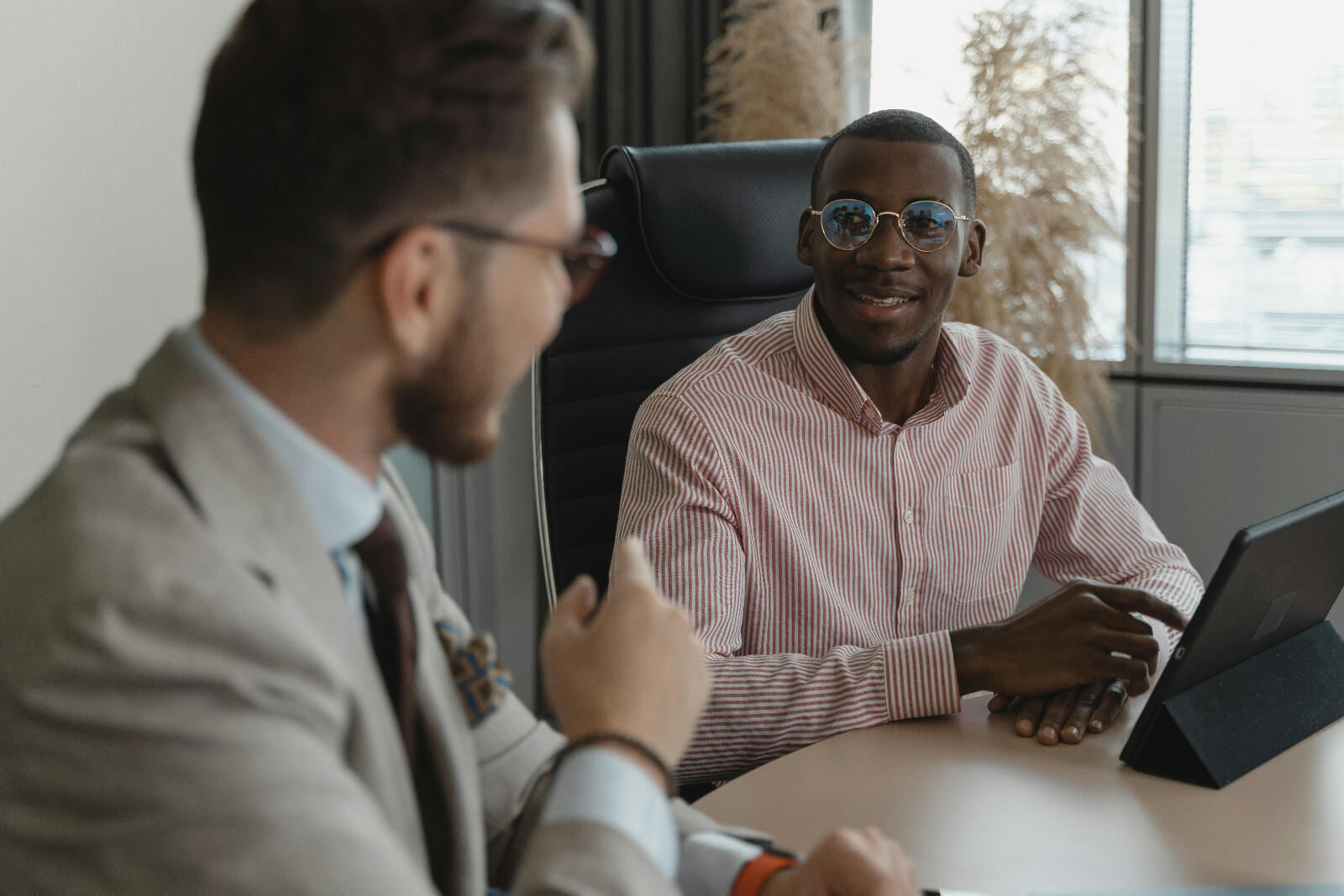 Two professionals reviewing planning options